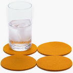 Graf Lantz - Bierfilzl Merino Wool Round Coasters Set of 4 - Turmeric (4" Circles) - Absorbs 30% of Weight - German Wool - Heat Resistant, Sustainable, & Reusable - Home Decor & Coffee Table Decor