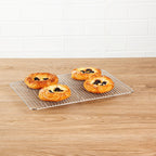 Restaurantware Met Lux 9.8 x 14.8 Inch Wire Baking Rack 1 Heavy-Duty Oven Wire Rack - Fits Jelly Roll Pan Dishwashable Stainless Steel Cooling Rack Elevated Feet Oven-Ready Up To 575F