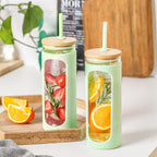 Kodrine 20oz Glass Tumbler with Straw and Lid, Iced Coffee Cups with Bamboo Lids, Glass Cups for Cold Drinks, Smoothie Cup with Silicone Sleeve for Travel, Work, BPA FREE-MintCream