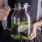 88oz Glass Pitcher with Lid and Handle - High Heat Resistance Glass Water Pitcher for Hot/Cold Water & Iced Tea (2.6L)