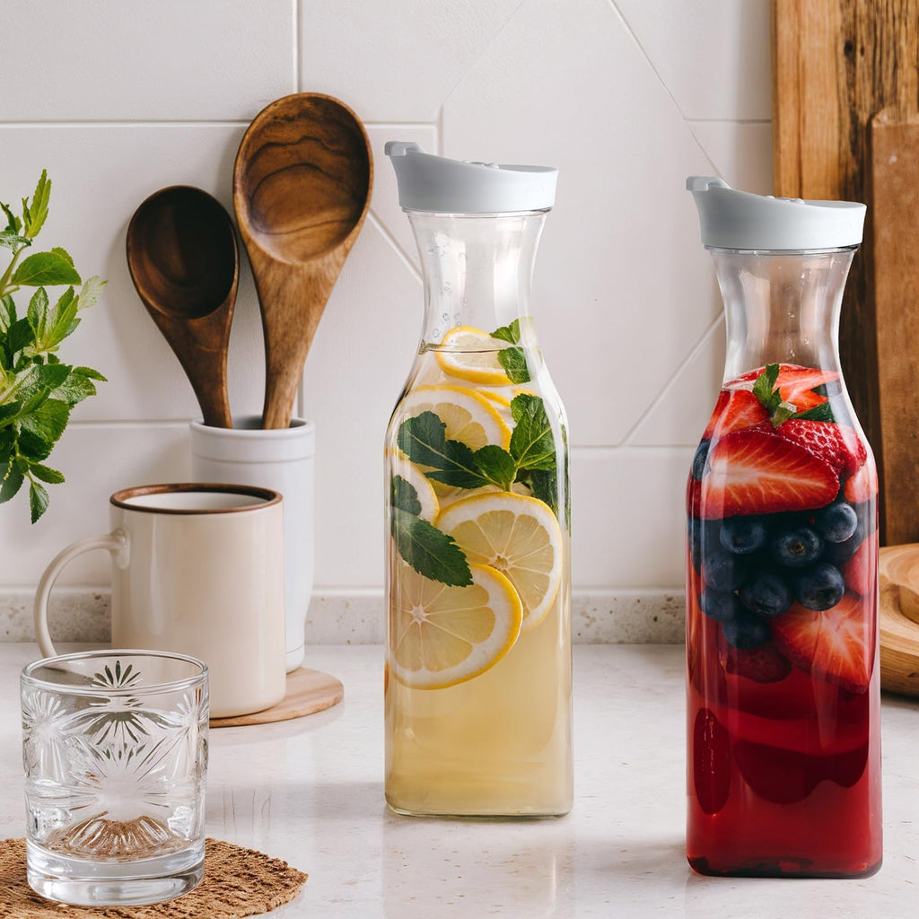 GUSTO [50 oz - 8 Pack] Plastic Carafe with Lid, Large Capacity Square Base - Clear Pitcher with Flip Top Lid, Easy-Pour Spout Juice Containers with Lids - Perfect for Mimosa Bar, Water, and Cold brew