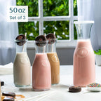 Glass Carafe Pitchers, by Kook, Large Carafe - set of 3, Beverage Dispensers, Clear Jugs For Mimosas, Water, Wine, Milk and Juice, with Plastic Lids, 50 oz Dishwasher Safe