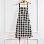 Solino Home Linen Bib Apron for Men & Women - Black and Cream Kitchen Apron with Front Pockets - Handcrafted from European Flax