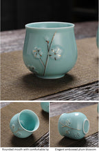 KEYDUACU Japanese Tea Set, Kiln-Formed Ceramic TeaSet, Plum Blossom Embossed, Includes 1 Teapot, 6 Teacups,Tea Tray,Strainer, Used for home, outdoor, gift, Chinese Kung Fu Tea Sets(FDMH-CYAN-MU)