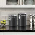 Oggi Stainless Steel Kitchen Canister 47 fl oz, Black - Airtight Clamp Lid, Clear See-Thru Top - Ideal for Kitchen Storage, Food Storage, Pantry Storage. Large Size 5" x 6".