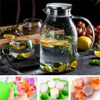 88oz Glass Pitcher with Lid and Handle - High Heat Resistance Glass Water Pitcher for Hot/Cold Water & Iced Tea with Ice Tray (2.6L)