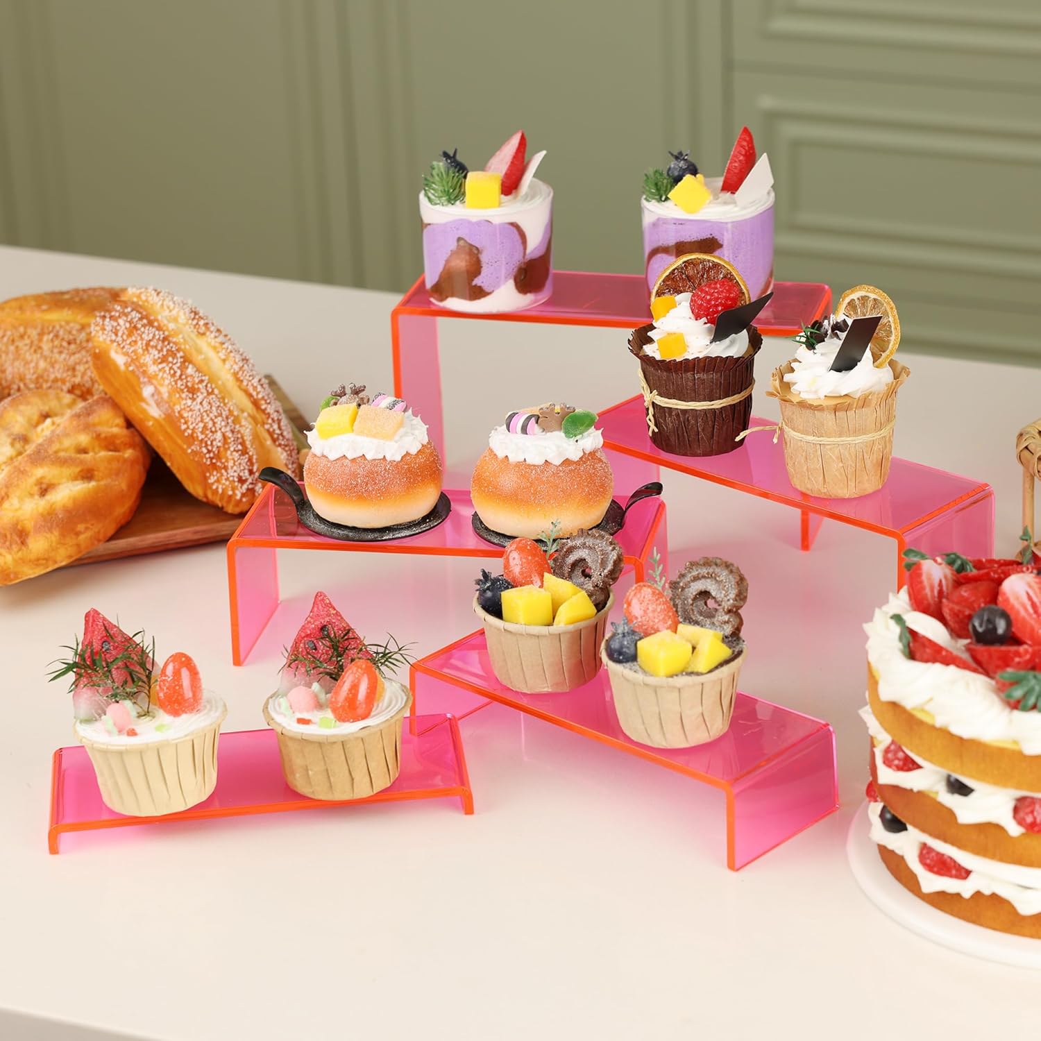 Goabroa Acrylic Display Risers, 2 Sets 10 Pcs Perfume Stand Organizer, Rectangular Riser Shelves for Figures, Cupcake, perfume display, Wine Glass and Handbag display，Transparent Pink