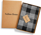 Solino Home Linen Bib Apron for Men & Women - Black and White Plaid Kitchen Apron with Front Pockets - Handcrafted from European Flax