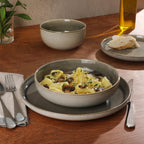 Gibson Elite Sunveil 16 Piece (Service for 4) Plates and Bowls Reactive Glaze Round Dishes Stoneware Ceramic Dinnerware Set -Taupe