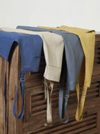 Solino Home Linen Bib Apron for Men & Women - 100% Pure Linen Blue Kitchen Apron with Front Pockets - Handcrafted from European Flax